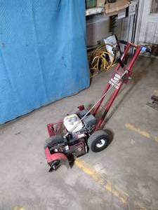 lot 65A image: Commercial grade Gas-Powered Edging Machine. 4HP Honda engine.  Starts up