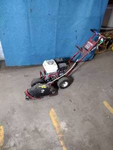lot 95A image: Brown R460HA Wire Master Mole, Honda GX160. Install invisible dog fencing.