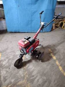 lot 66A image: Honda Mid-tine Tiller GX 160  (gr1) engine started up