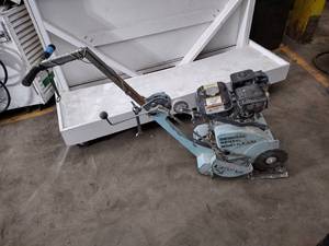 lot 309 image: Walk Behind Early Entry Concrete Saw 8 Diameter blade.  4hp gas Honda engine