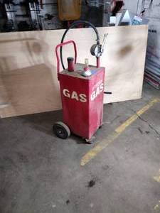 lot 335 image: Arksen Portable Gas Caddy Fuel Storage Tank on rolling wheels.