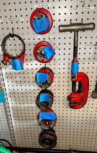 lot 235 image: (8) Ridgid pipe cutters  inch,  inch, 1 inch, 1  inch, 1  inch pipe die, 2 inch pipe die. Pipe threader, 2 inch pipe cutter