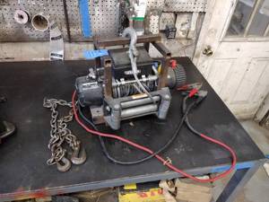 lot 111A image: Ironton 12V electric  truck winch, 12,000 LB load capacity, 65-foot wire rope with hook,  Item # 54126