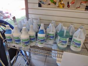 lot 417 image: (24) Bottles of Marvel carpet cleaner quart sizes and gallon sizes.
