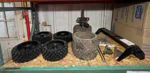 lot 228 image: Classen 18Sod cutter blade 13-tooth sprocket Cast iron pillow block (4) 3 wide wheels wstud spikes 6 wide wheels wstuds.