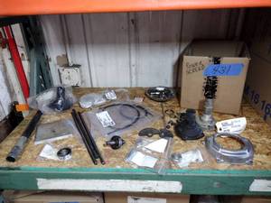 lot 431 image: Multiquip Parts Throttle cable, fan cover, clutch assy, bearings, pin drive coupling and more.