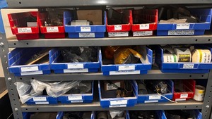 lot 37A image: Gray shelving with all of the parts seen. Lots of $ here.