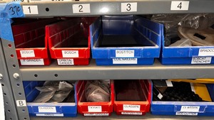 lot 37C image: Gray shelving with all of the parts seen. Lots of $ here.