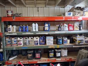 lot 415 image: Oil, Antifreeze, Transmission Fluid on 3 shelves