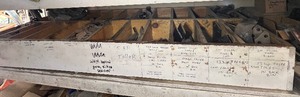 lot 439 image: Long bin of tines for dingo & other tillers etc