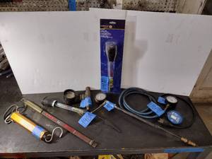 lot 190A image: 7 testersAntifreeze, compression, appliance load, pressure washer, PSI bar, and chipper clutch adjust tool
