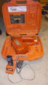 lot 569 image: PASLODE Cordless Framing Nailer with Charger and Battery.
