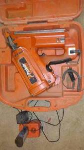 lot 582 image: PASLODE Cordless Framing Nailer with Charger and Battery.