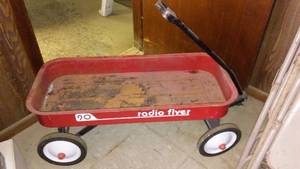 lot 604 image: Red Radio Flyer Wagon.