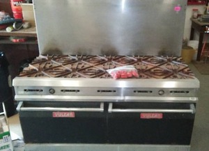 lot 598 image: Vulcan 10-Burner Gas Stove.