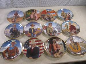lot 46 image: (EW3) The Danbury Mint John Wayne Collector Plate Set of 12 - 1 Dish Broke and Repaired with Chip