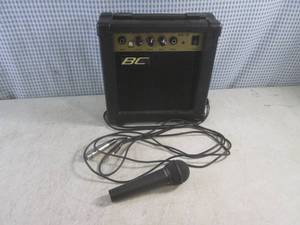 lot 212 image: (D-3) Behringer XM8500 Ultravoice Microphone with Cable and BC GA10 Guitar Amplifier.
