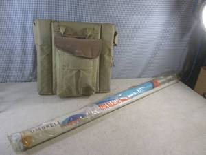 lot 241 image: (C-2) Stadium Seat with Blanket and Umbrella