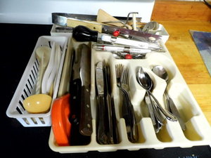 silverware tray full of silverware ...