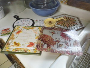 variety of trivets x7...