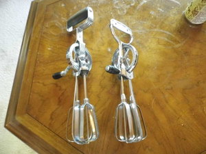 2 black handled Ekco hand beaters, ...