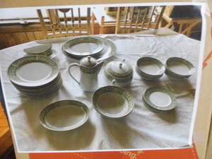 2 boxes of glass dishware green des...