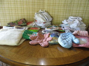 box of kitchen linens, towels, wash...