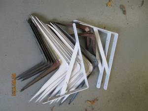 Collection of metal shelf brackets...