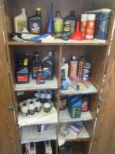 Storage Cabinet loaded with automot...