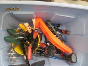 Storage tote containing hand held g...