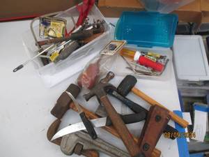 Assorted hammers, pliers, knives an...