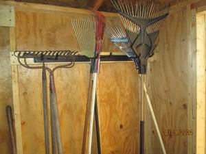 Corner grouping of metal tine rakes