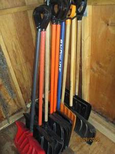 Collection of snow removal shovels.