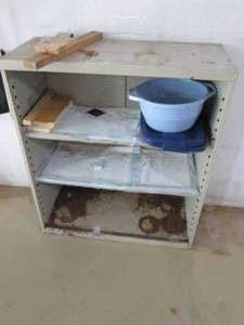 4 tall metal shelf with contents...