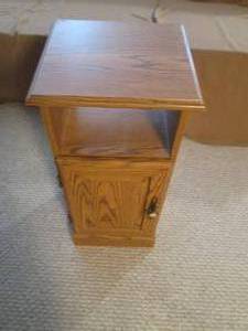 End table measures 13 wide 27 tal...