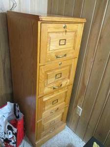 Wood file cabinet with keyed lock, ...