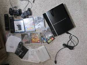 PS3 game system with assorted games...