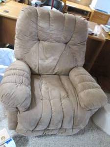 Plush and comfy tan recliner...