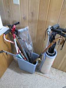 Large assortment of canes and reach...