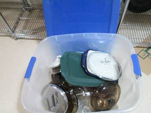 Covered totes full of assorted baki...