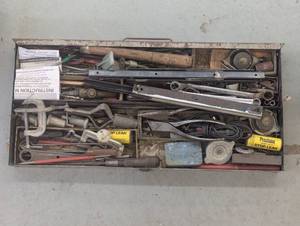 Metal storage drawer containing a l...