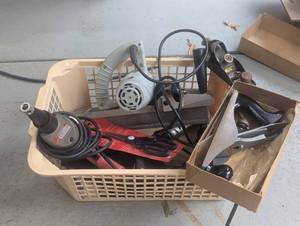 Basket of misc cordless and corded ...