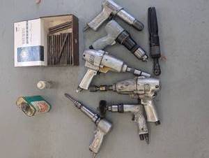 Assortment of pneumatic power tools...
