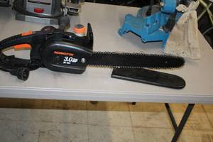 lot 57 image: Remington MOD300 3.0-HP 16 Electric Chainsaw M30016AS
