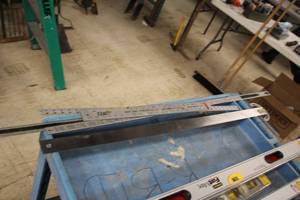 lot 86 image: Assorted Metal Measuring Sticks, Straight Edges, Adjustable T-Square
