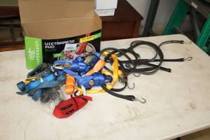 lot 179 image: Lot of (1 Box) Assorted Ratchet Straps and Rubber Bungee Cords