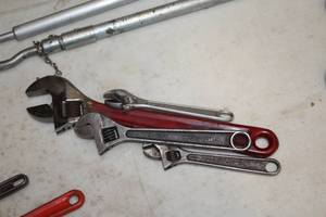 lot 209 image: Lot of (4) Assorted Adjustable Wrenches