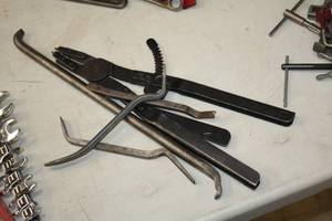 lot 243 image: Assorted Hand Tools - Pry Bars, Snap Ring Pliers