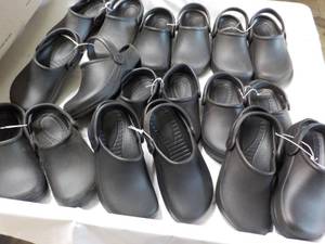 9 pair new size 535 Black Clogs...