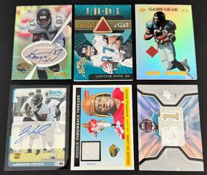 lot 28B image: 6 Jacksonville Jaguars Autos, Relic, Numbered Cards - Keenan McCardell Auto 40 and Relic 350, Fred Taylor Relic, Byron Leftwich Relic, LeBrandon Toefield Rookie Auto, Reggie Williams Relic Football Cards